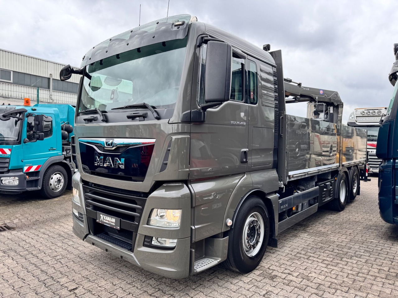 MAN 26.460 TGX Baustoffkran HMF 2110-L3 - Caminhão grua: foto 2 MAN 26.460 TGX Baustoffkran HMF 2110-L3 - Caminhão grua: foto 2